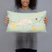 Person holding 20x12 Custom Midland South Dakota Map Throw Pillow in Woodblock