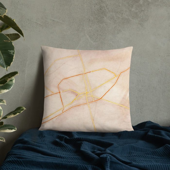 Custom Midland Texas Map Throw Pillow in Watercolor on Bedding Against Wall