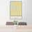 24x36 Miller County Georgia Map Print Portrait Orientation in Woodblock Style Behind 2 Chairs Table and Potted Plant