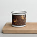 Front View Custom Milpitas California Map Enamel Mug in Ember on Cutting Board