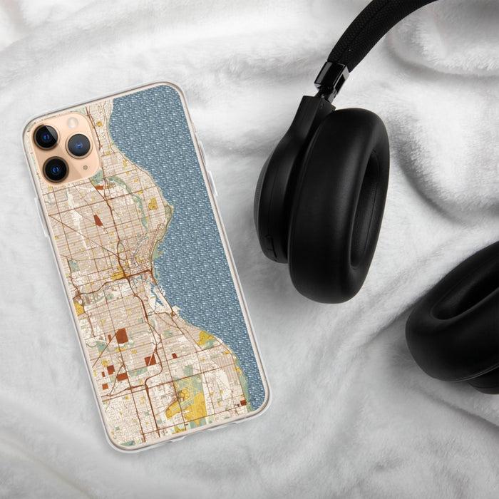 Custom Milwaukee Wisconsin Map Phone Case in Woodblock on Table with Black Headphones