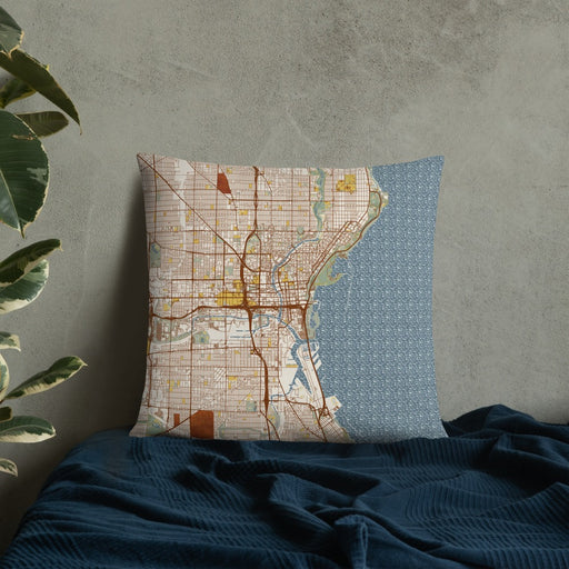 Custom Milwaukee Wisconsin Map Throw Pillow in Woodblock on Bedding Against Wall