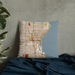 Custom Milwaukee Wisconsin Map Throw Pillow in Woodblock on Bedding Against Wall