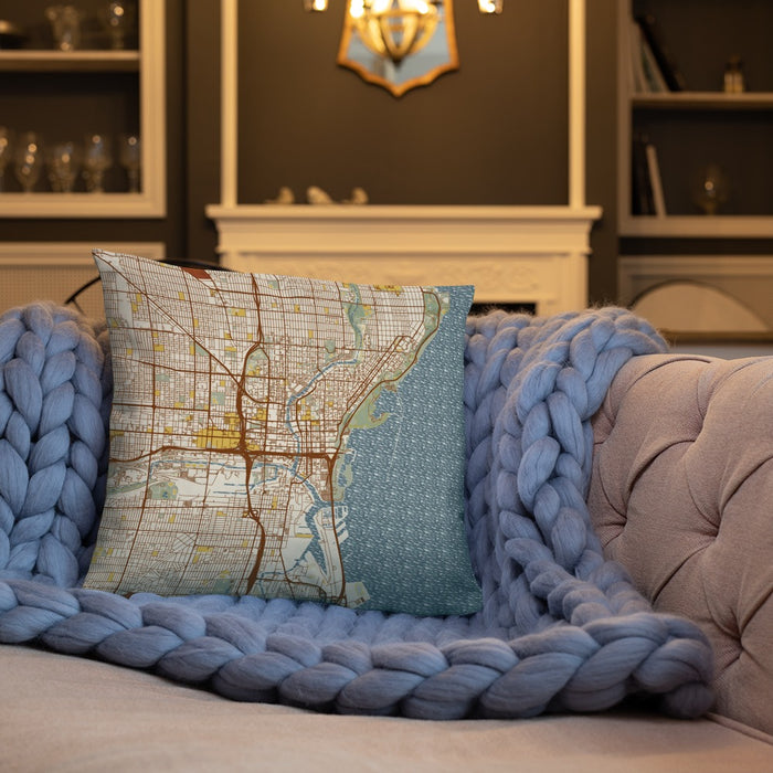 Custom Milwaukee Wisconsin Map Throw Pillow in Woodblock on Cream Colored Couch
