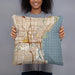 Person holding 18x18 Custom Milwaukee Wisconsin Map Throw Pillow in Woodblock