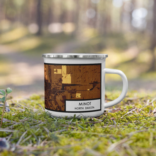 Right View Custom Minot North Dakota Map Enamel Mug in Ember on Grass With Trees in Background