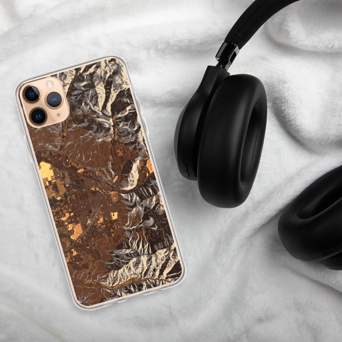 Custom Missoula Montana Map Phone Case in Ember on Table with Black Headphones