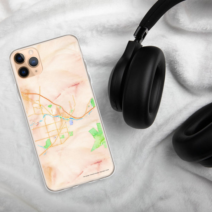 Custom Missoula Montana Map Phone Case in Watercolor on Table with Black Headphones