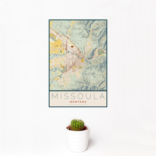 12x18 Missoula Montana Map Print Portrait Orientation in Woodblock Style With Small Cactus Plant in White Planter