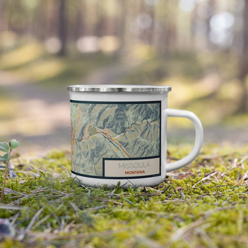 Right View Custom Missoula Montana Map Enamel Mug in Woodblock on Grass With Trees in Background