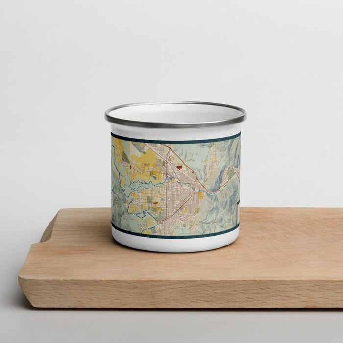 Front View Custom Missoula Montana Map Enamel Mug in Woodblock on Cutting Board