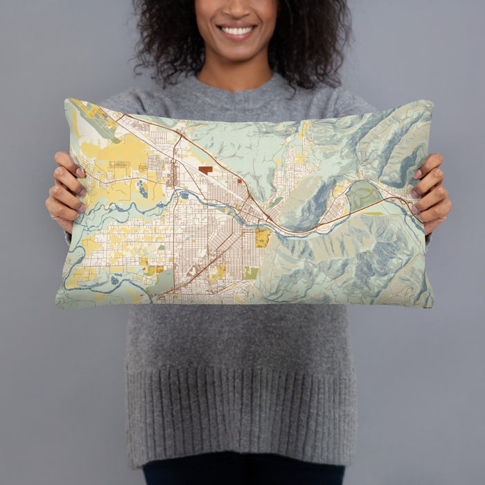 Person holding 20x12 Custom Missoula Montana Map Throw Pillow in Woodblock