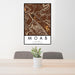 24x36 Moab Utah Map Print Portrait Orientation in Ember Style Behind 2 Chairs Table and Potted Plant