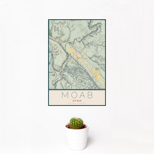 12x18 Moab Utah Map Print Portrait Orientation in Woodblock Style With Small Cactus Plant in White Planter