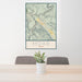24x36 Moab Utah Map Print Portrait Orientation in Woodblock Style Behind 2 Chairs Table and Potted Plant