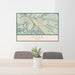 24x36 Moab Utah Map Print Landscape Orientation in Woodblock Style Behind 2 Chairs Table and Potted Plant