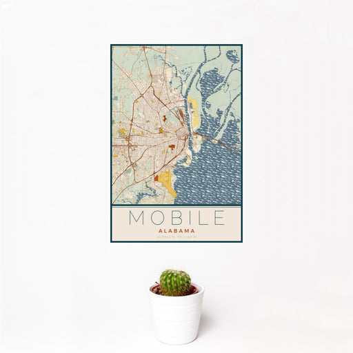 12x18 Mobile Alabama Map Print Portrait Orientation in Woodblock Style With Small Cactus Plant in White Planter