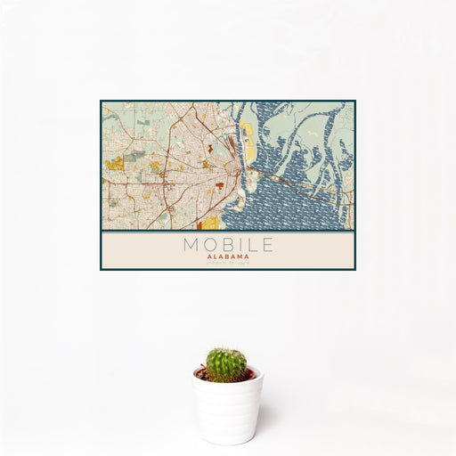 12x18 Mobile Alabama Map Print Landscape Orientation in Woodblock Style With Small Cactus Plant in White Planter