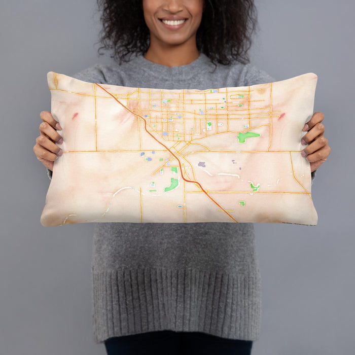 Person holding 20x12 Custom Modesto California Map Throw Pillow in Watercolor