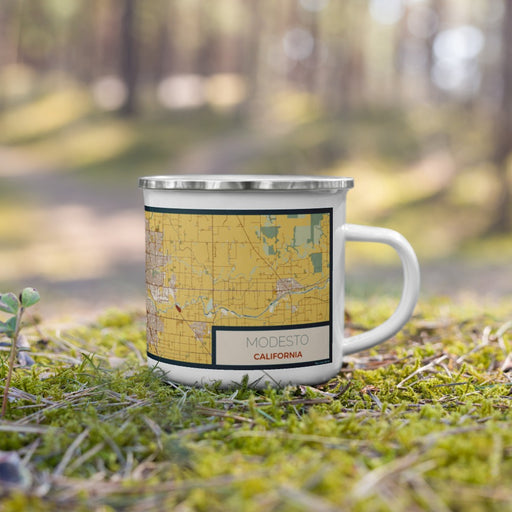 Right View Custom Modesto California Map Enamel Mug in Woodblock on Grass With Trees in Background