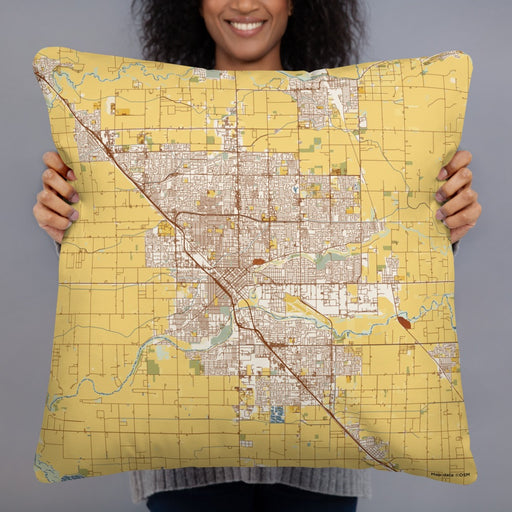 Person holding 22x22 Custom Modesto California Map Throw Pillow in Woodblock