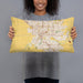 Person holding 20x12 Custom Modesto California Map Throw Pillow in Woodblock