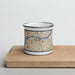 Front View Custom Moline Illinois Map Enamel Mug in Woodblock on Cutting Board