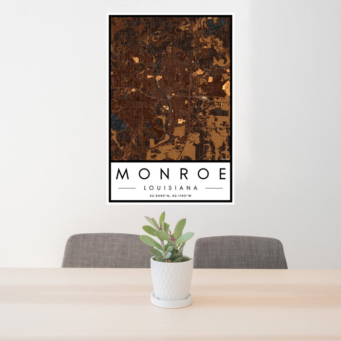 24x36 Monroe Louisiana Map Print Portrait Orientation in Ember Style Behind 2 Chairs Table and Potted Plant
