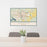24x36 Monroe Louisiana Map Print Landscape Orientation in Woodblock Style Behind 2 Chairs Table and Potted Plant