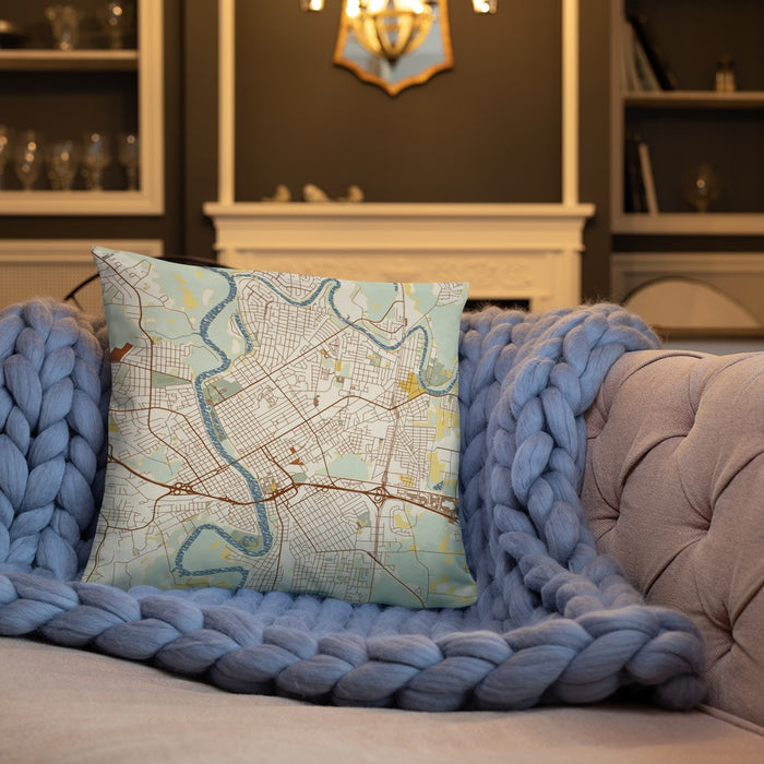 Custom Monroe Louisiana Map Throw Pillow in Woodblock on Cream Colored Couch