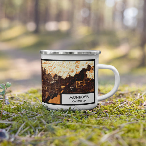 Right View Custom Monrovia California Map Enamel Mug in Ember on Grass With Trees in Background