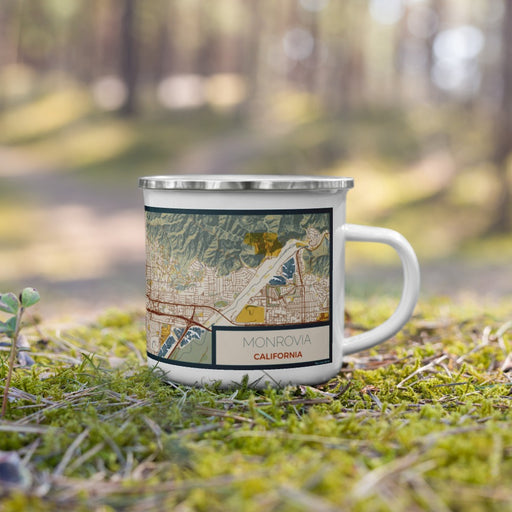 Right View Custom Monrovia California Map Enamel Mug in Woodblock on Grass With Trees in Background
