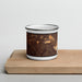 Front View Custom Montebello California Map Enamel Mug in Ember on Cutting Board