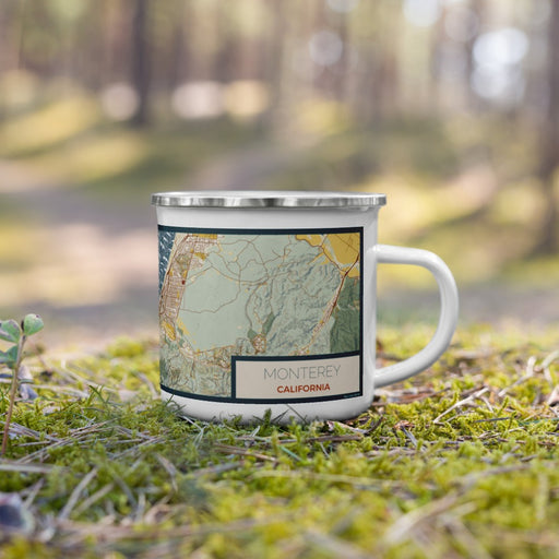 Right View Custom Monterey California Map Enamel Mug in Woodblock on Grass With Trees in Background