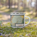 Right View Custom Monterey California Map Enamel Mug in Woodblock on Grass With Trees in Background
