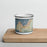 Front View Custom Monterey California Map Enamel Mug in Woodblock on Cutting Board