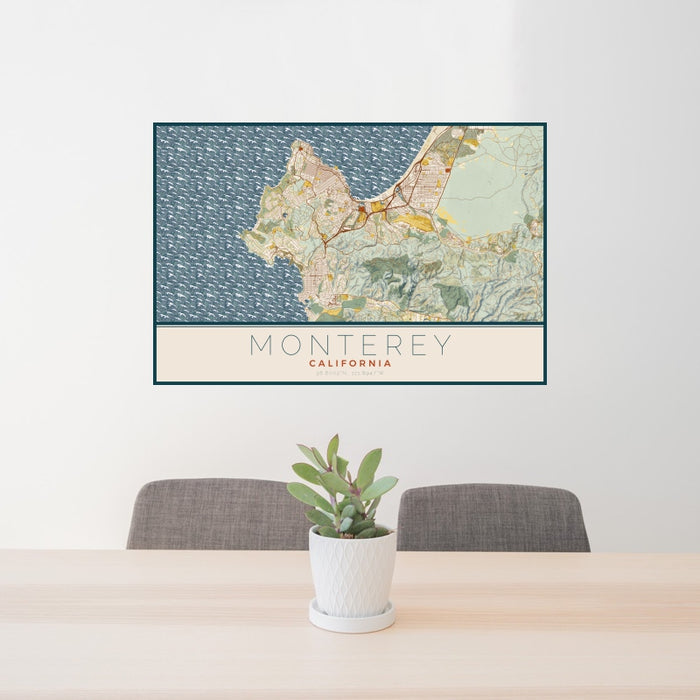 24x36 Monterey California Map Print Landscape Orientation in Woodblock Style Behind 2 Chairs Table and Potted Plant