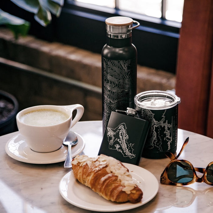 20oz Stainless Steel Insulated Bottle with Bamboo Top in Black with Custom Engraving of Map on Table with Flask Cup