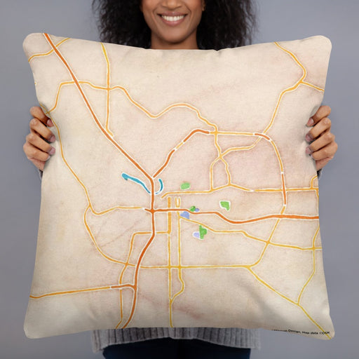 Person holding 22x22 Custom Montgomery Alabama Map Throw Pillow in Watercolor