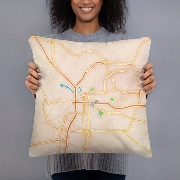 Person holding 18x18 Custom Montgomery Alabama Map Throw Pillow in Watercolor
