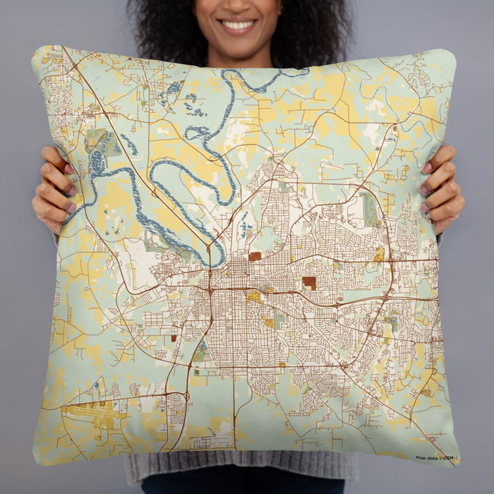 Person holding 22x22 Custom Montgomery Alabama Map Throw Pillow in Woodblock