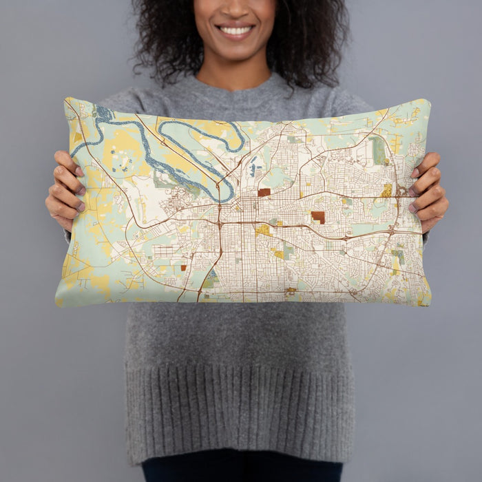Person holding 20x12 Custom Montgomery Alabama Map Throw Pillow in Woodblock