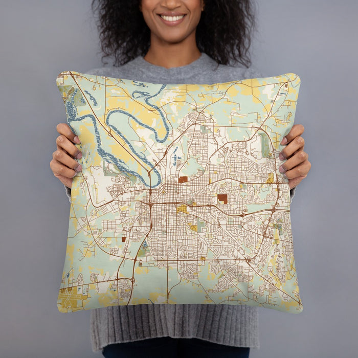 Person holding 18x18 Custom Montgomery Alabama Map Throw Pillow in Woodblock