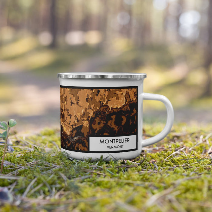 Right View Custom Montpelier Vermont Map Enamel Mug in Ember on Grass With Trees in Background
