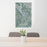 24x36 Montrose Colorado Map Print Portrait Orientation in Afternoon Style Behind 2 Chairs Table and Potted Plant
