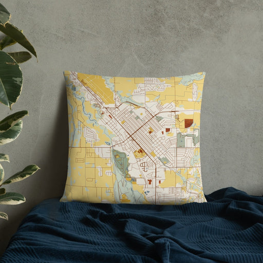 Custom Montrose Colorado Map Throw Pillow in Woodblock on Bedding Against Wall