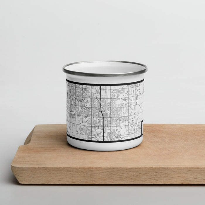 Front View Custom Moore Oklahoma Map Enamel Mug in Classic on Cutting Board