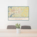 24x36 Mooresville North Carolina Map Print Lanscape Orientation in Woodblock Style Behind 2 Chairs Table and Potted Plant