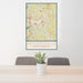 24x36 Mooresville North Carolina Map Print Portrait Orientation in Woodblock Style Behind 2 Chairs Table and Potted Plant