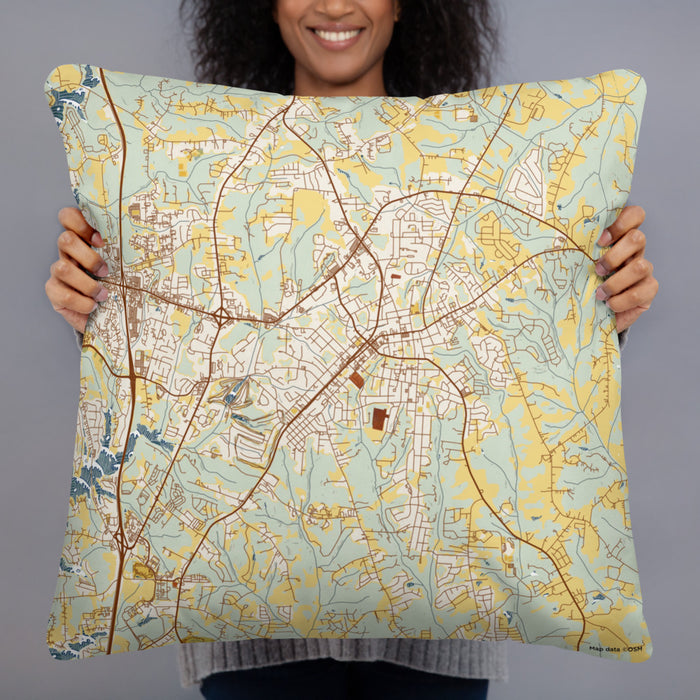 Person holding 22x22 Custom Mooresville North Carolina Map Throw Pillow in Woodblock